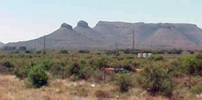 The famous "Three Sisters", three geological examples of typical Karoo hills.